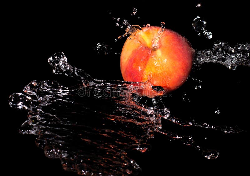 Peach in spray of water. stock photo. Image of tasty 32666866