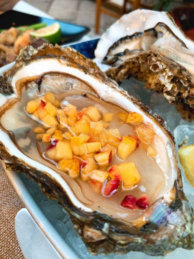 Peach vodka oyster stock photo. Image of oyster, seafood 231349392