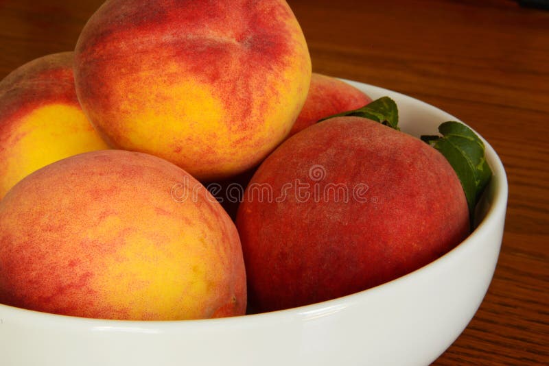 Peaches in bowl stock photo. Image of seasonal, wood 34125530