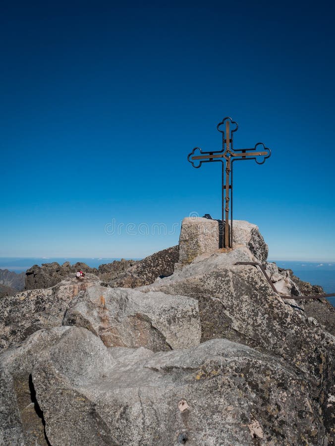 The peak of the highest mountain in Slovakia, Gerlachovsky Stit, on which a cross rises
