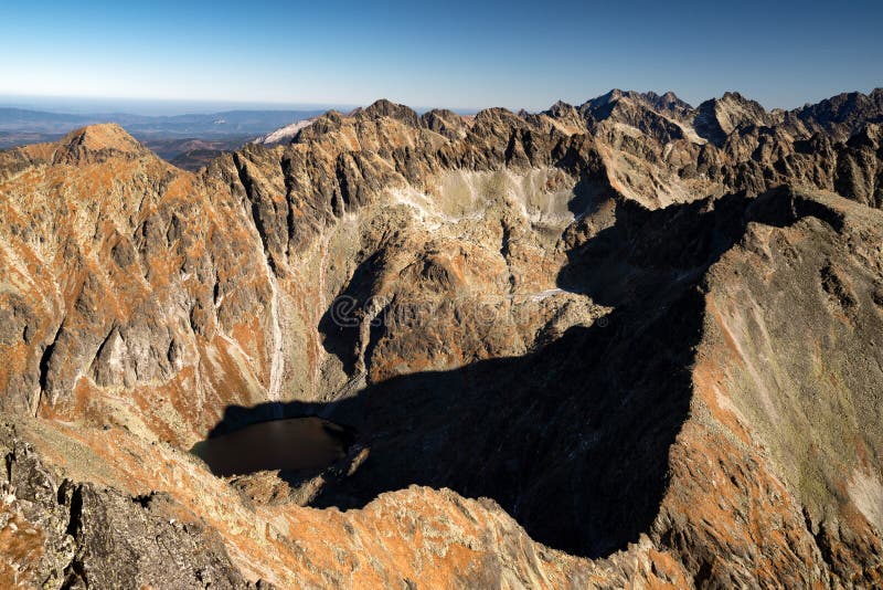 Peaks in mountains. View from peak Krivan in High Tatras mountains at Slovakia