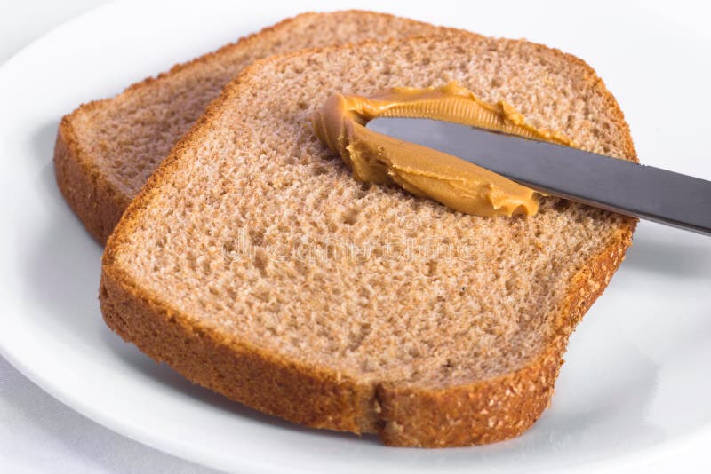 Peanut Butter on Whole Wheat Bread Stock Image - Image of creamy ...