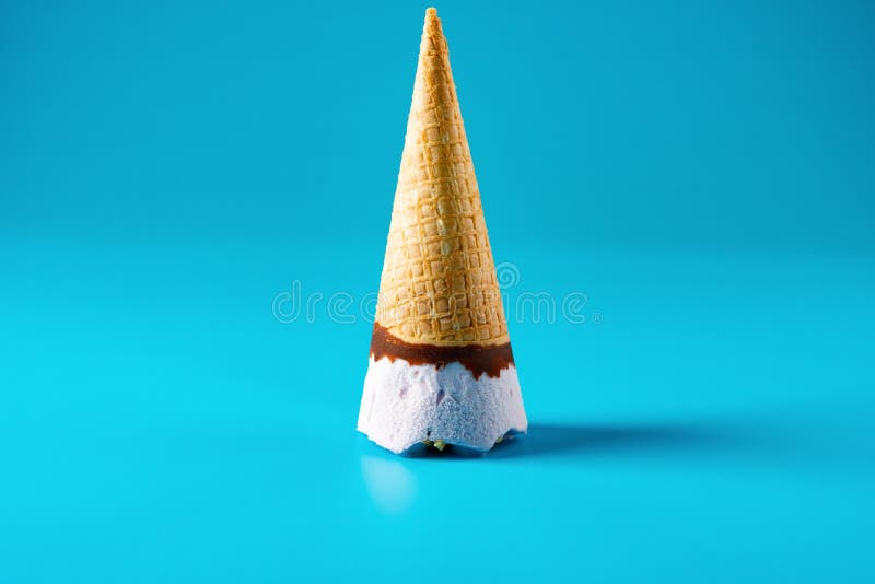 Peanut Ice Cream Cone Melted on Blue Background Stock Image Image of