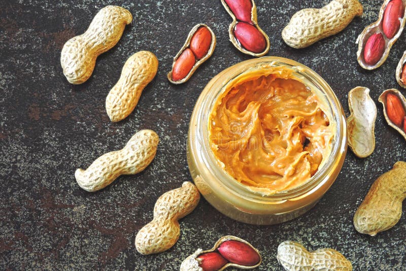 Peanut Paste and Peanuts. Vegan Snack. Vegetable Protein Concept. Stock Photo Image of oily
