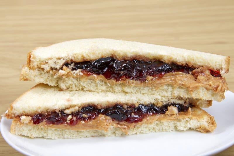 Peanutbutter and Jelly Sandwich Cut in Half Served on Plate Stock Image ...