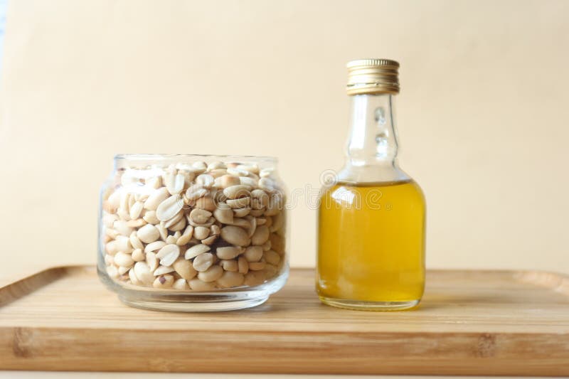Peanuts in a Jar and Oils in a Container Stock Image Image of natural