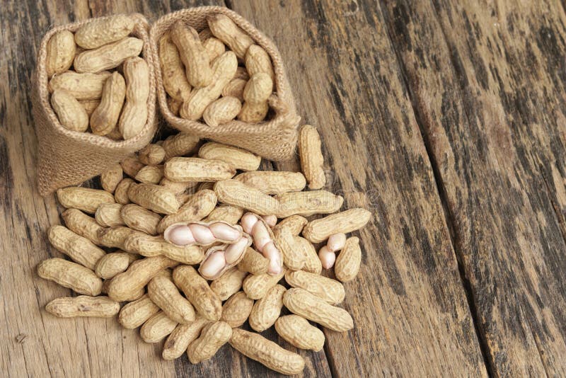 Peanuts in shells and sack bag stock photos Peanuts in shells and sack bag stock photos