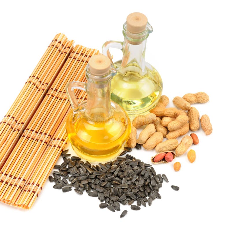 Peanuts and Vegetable Oils Isolated on White Background. Stock Image