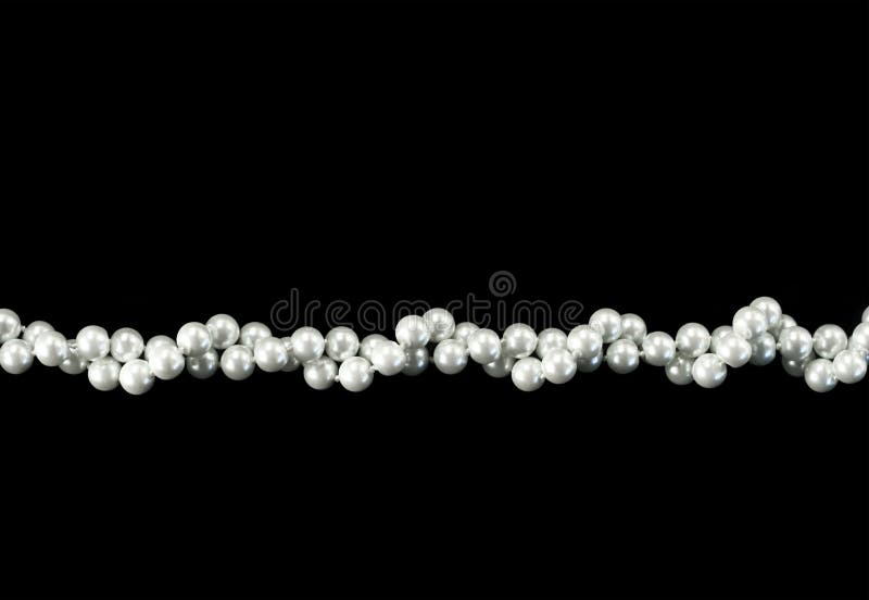 Pearl necklace isolated on black