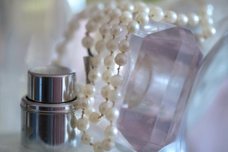 Pearl Necklace and Perfume Bottles Stock Photo - Image of jewellery ...