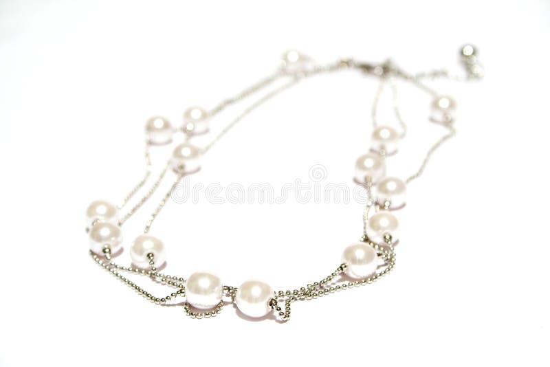 Pearl necklace on white isolated background
