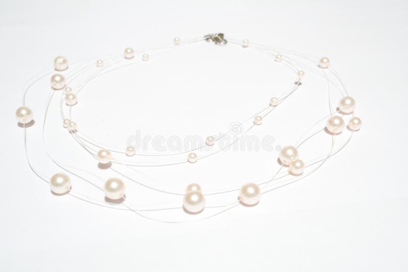 Pearl necklace on white isolated background