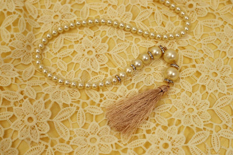 Pearls on lace background stock photo. Image of gold - 30541128