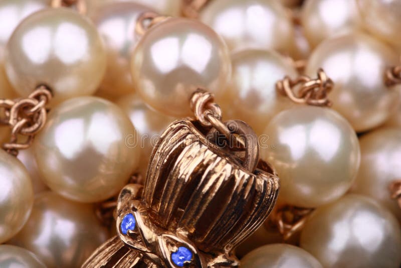 Pearls necklace extreme closeup stock photos