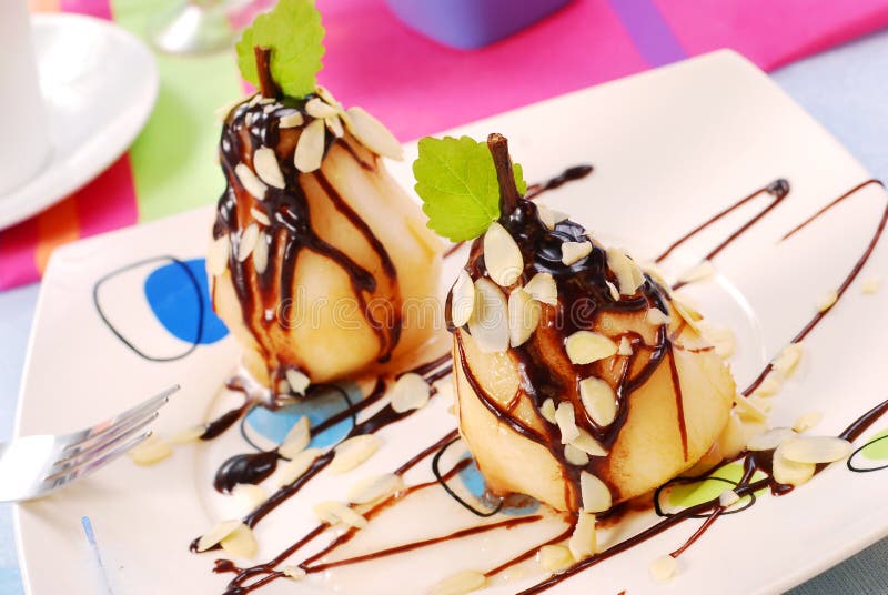 Pears with flaked almonds and chocolate sauce