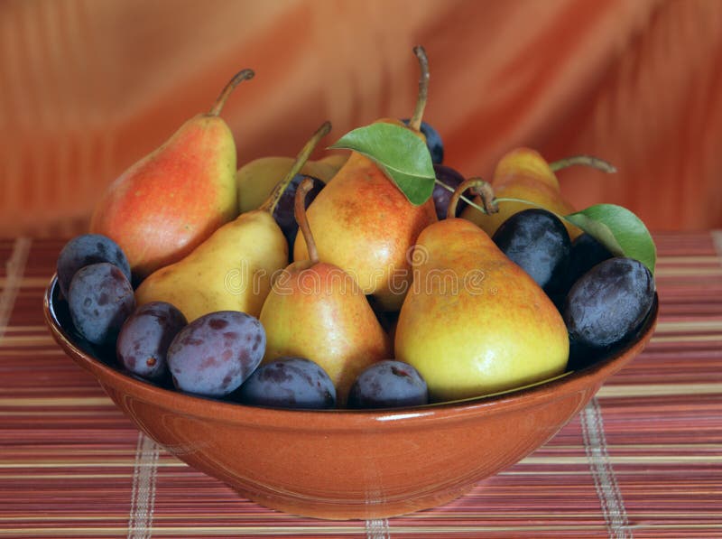 Pears and plums stock photo. Image of plate, colour, agriculture 10748204