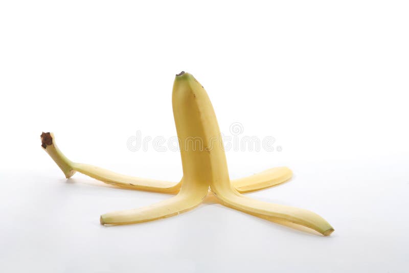 A banana peel over a white background. A banana peel over a white background