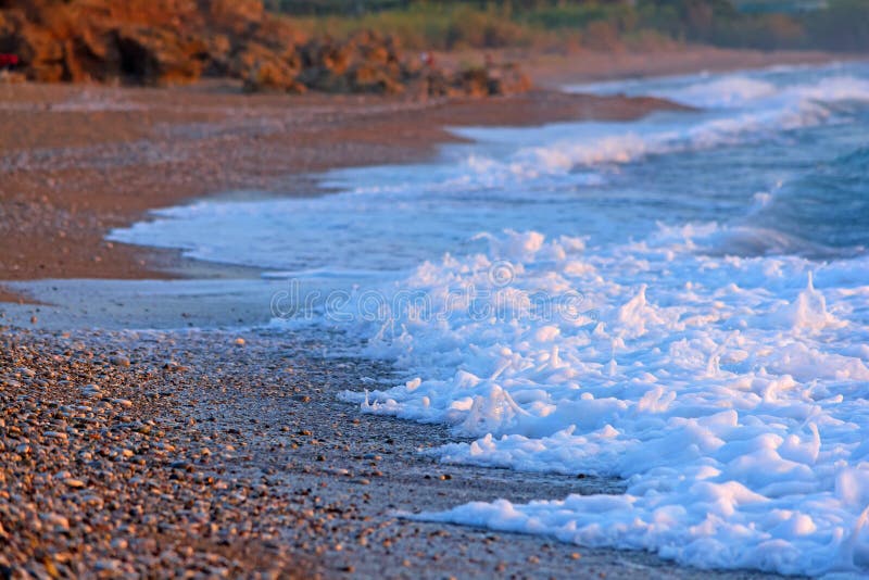 Pebble beach at Greece stock photo. Image of kyparissia 98465170