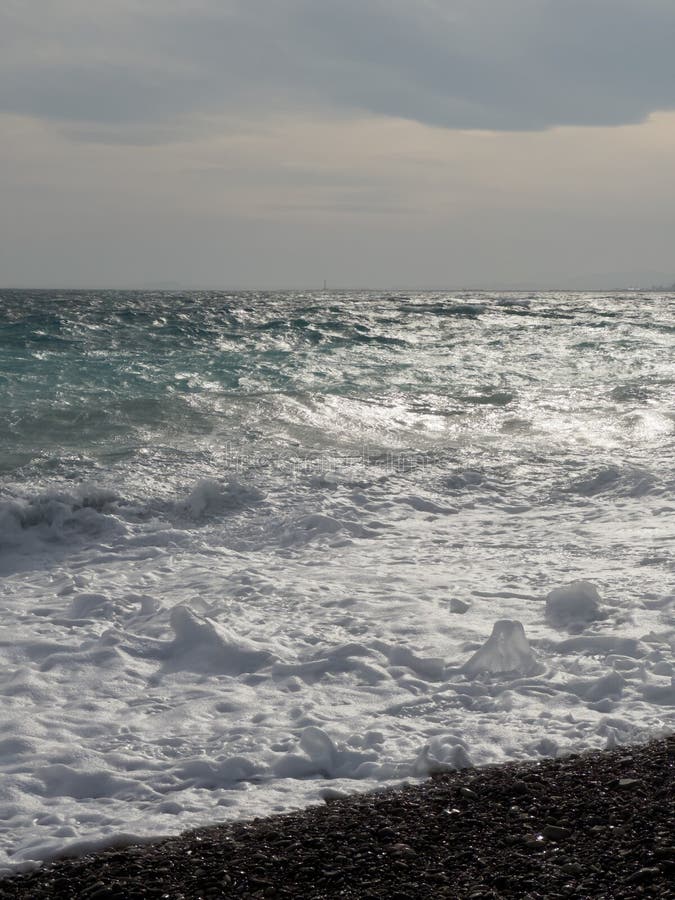 Pebble Beach of Nice, France with Azure Waves of Mediterranean Sea ...