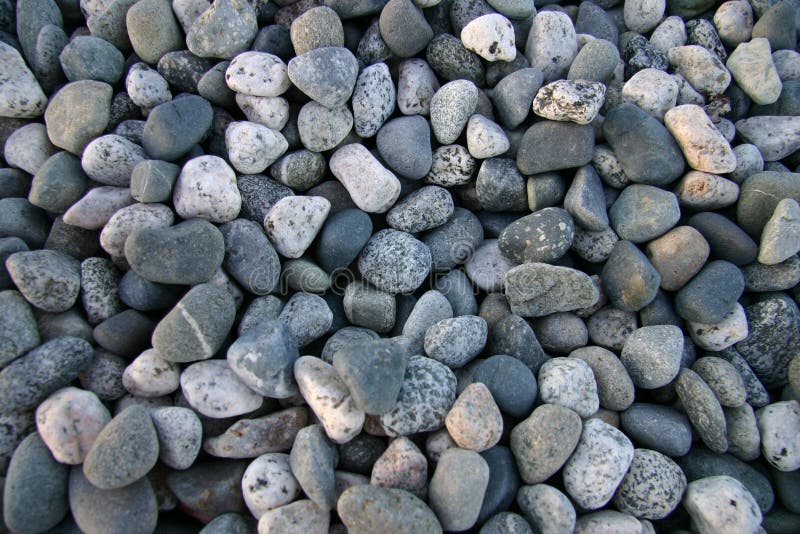 Pebbles on beach stock photos