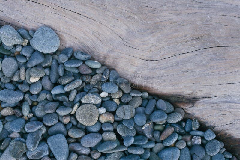 Pebbles and beach wood royalty free stock photos