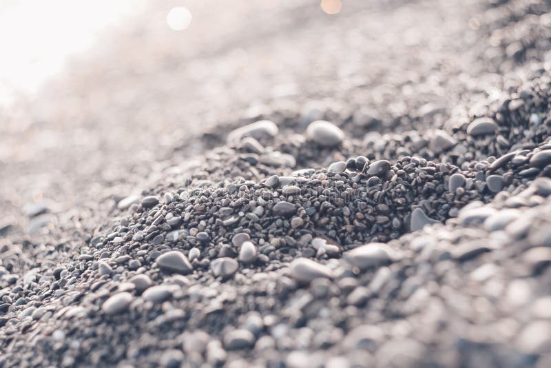 Pebbles on the sea shore stock image