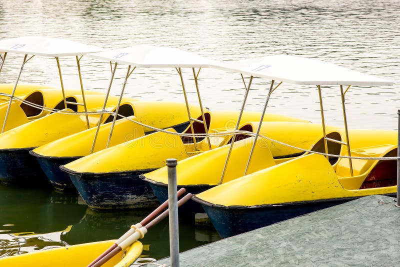 Yellow Pedal Boat stock image. Image of blue, sport, cloud 13050839