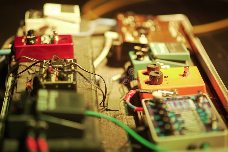 Pedals set of guitarist with many knobs royalty free stock photo Pedals set of guitarist with many knobs royalty free stock photo