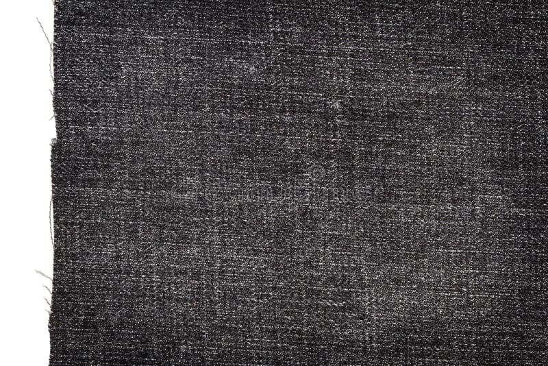 Pedazo de tela oscura de los vaqueros fotografía de archivo