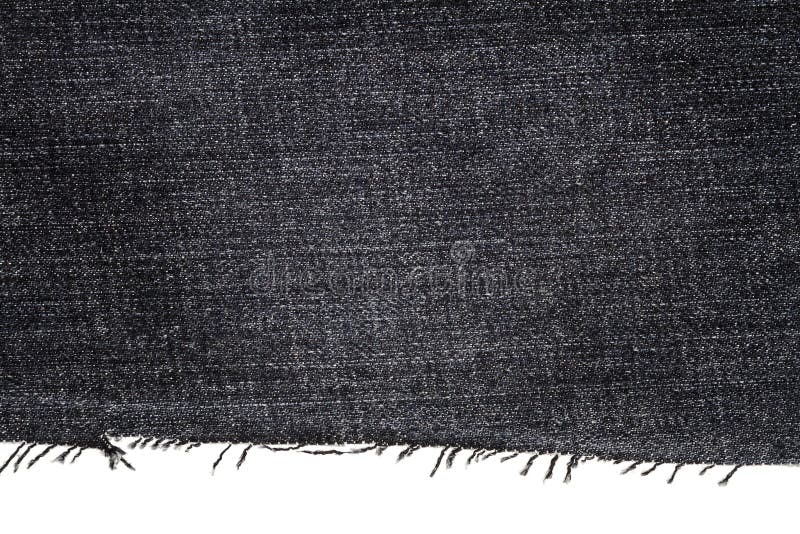 Pedazo de tela oscura de los vaqueros fotografía de archivo