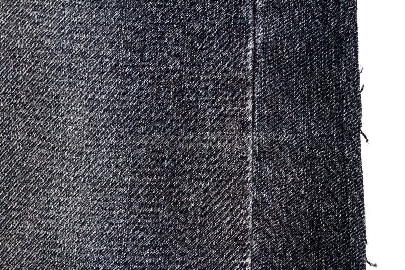 Pedazo de tela oscura de los vaqueros imagenes de archivo