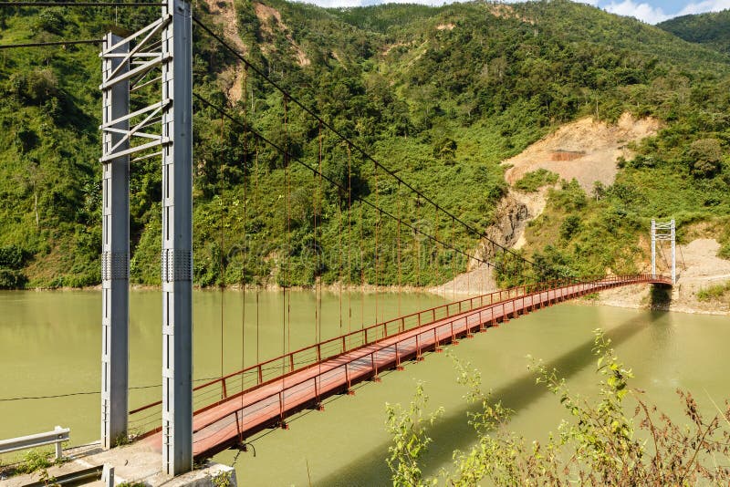 Pedestrian bridge over the Nam na River, Vietnam stock photos