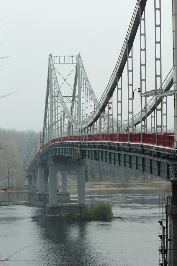 Pedestrian empty bridge in Kyiv on a rainy foggy day royalty free stock photography Pedestrian empty bridge in Kyiv on a rainy foggy day royalty free stock photography