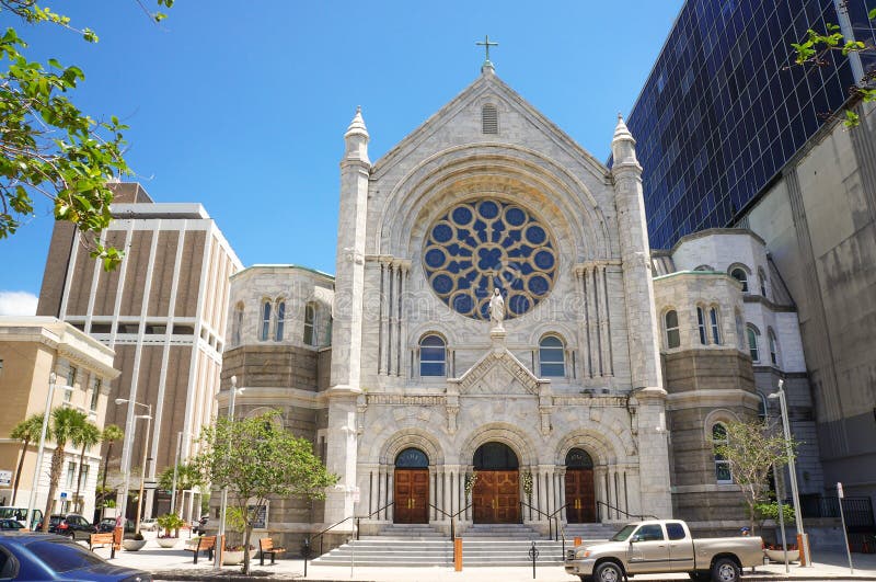 Pedestrians in front of Sacred Heart Catholic Church