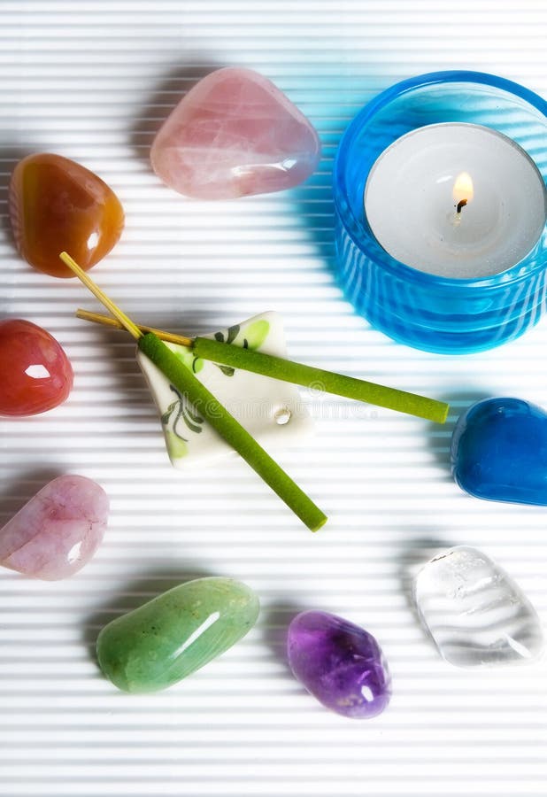 Esoteric wellness, reiky with healing stones in magic circle with stwo aroma sticks and a candle. Esoteric wellness, reiky with healing stones in magic circle with stwo aroma sticks and a candle