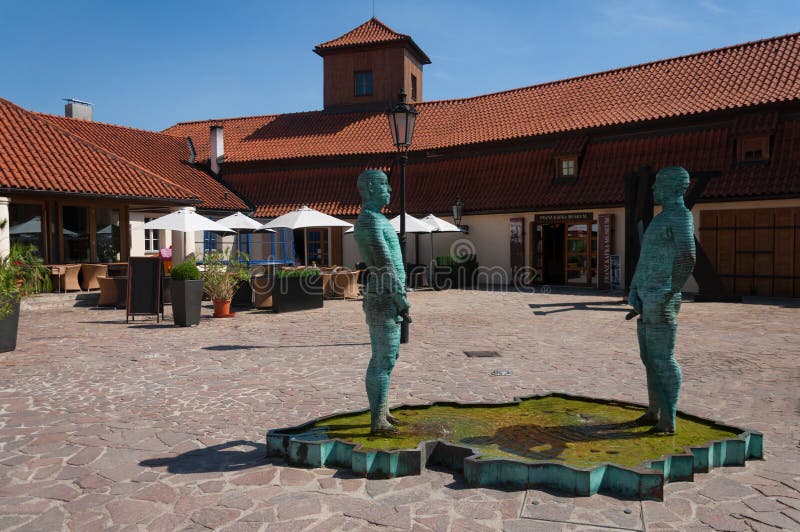 Pee statues in the courtyard of Franz Kafka Museum. Prague