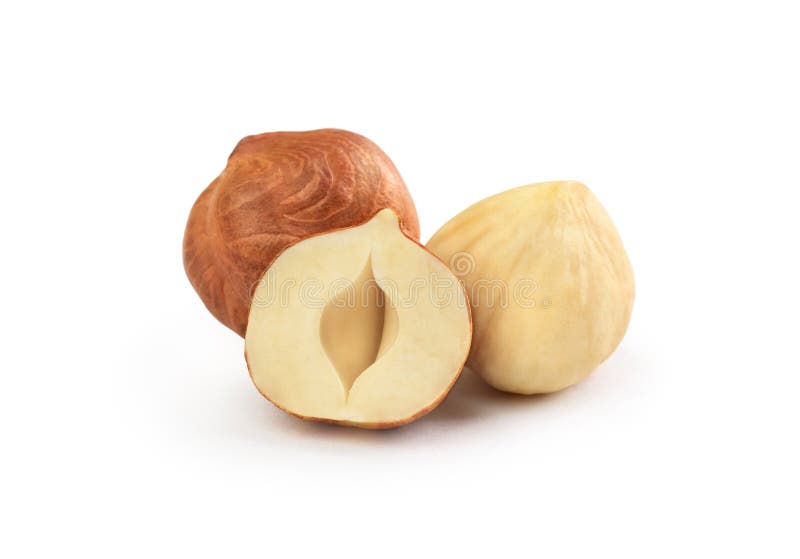 Peeled hazelnuts on a white background