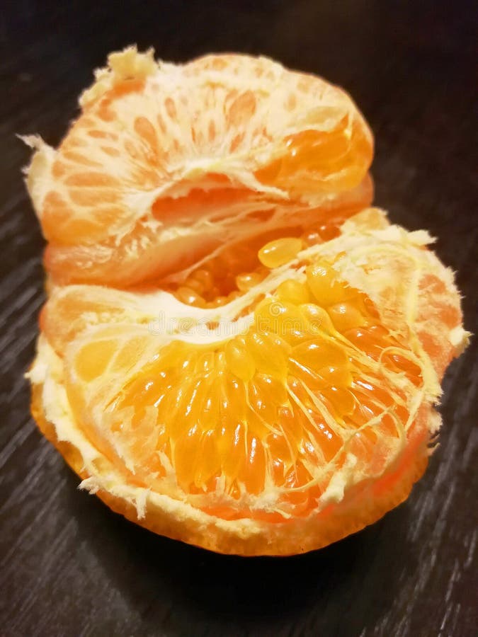 Peeled Mandarin Orange On Black Stock Photo Image Of Fruit Peel