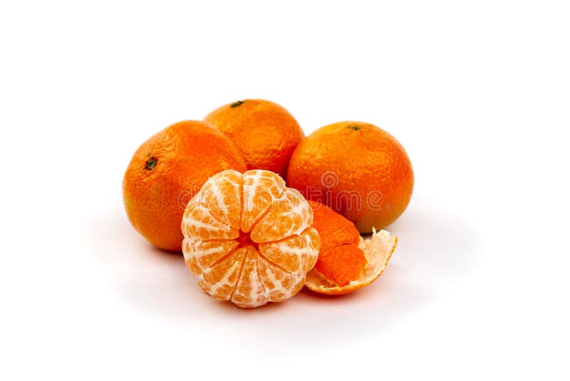 Peeled mandarin tangerine clementine segments  on white background