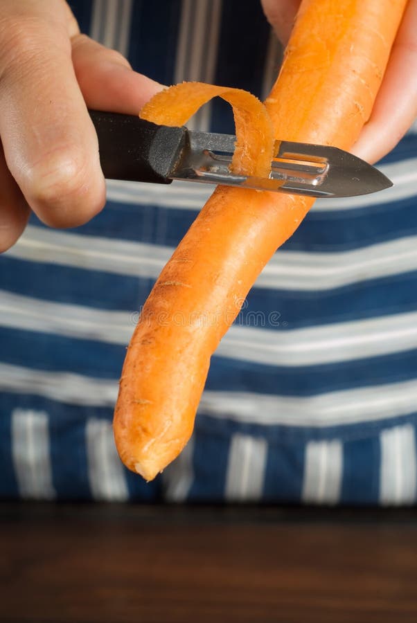 Peeling carrot stock image. Image of occupation, healthy 8235471