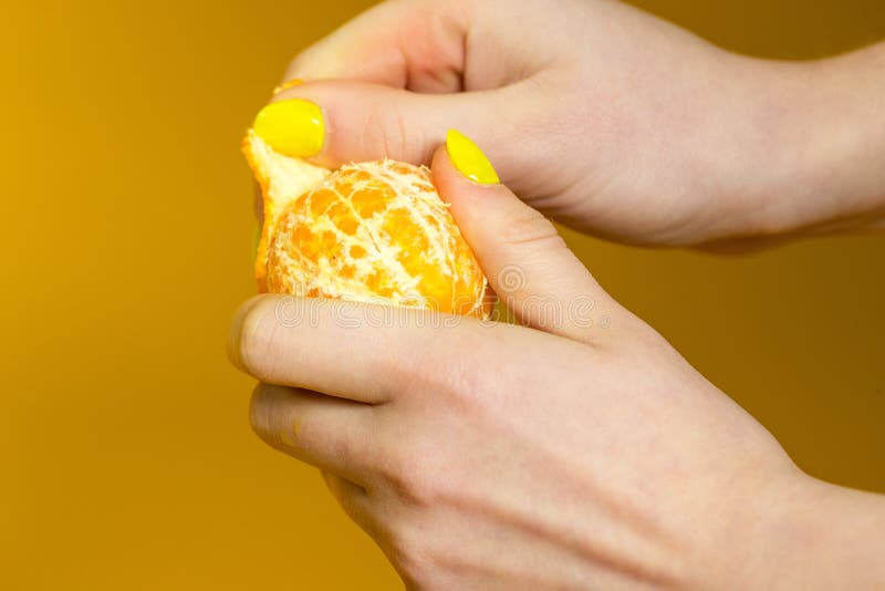 Peeling a Fresh Mandarin Orange Stock Photo Image of hand, fresh