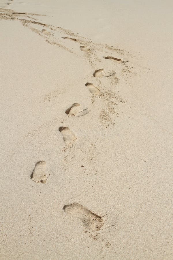 Pegadas na praia imagens de stock Pegadas na praia imagens de stock