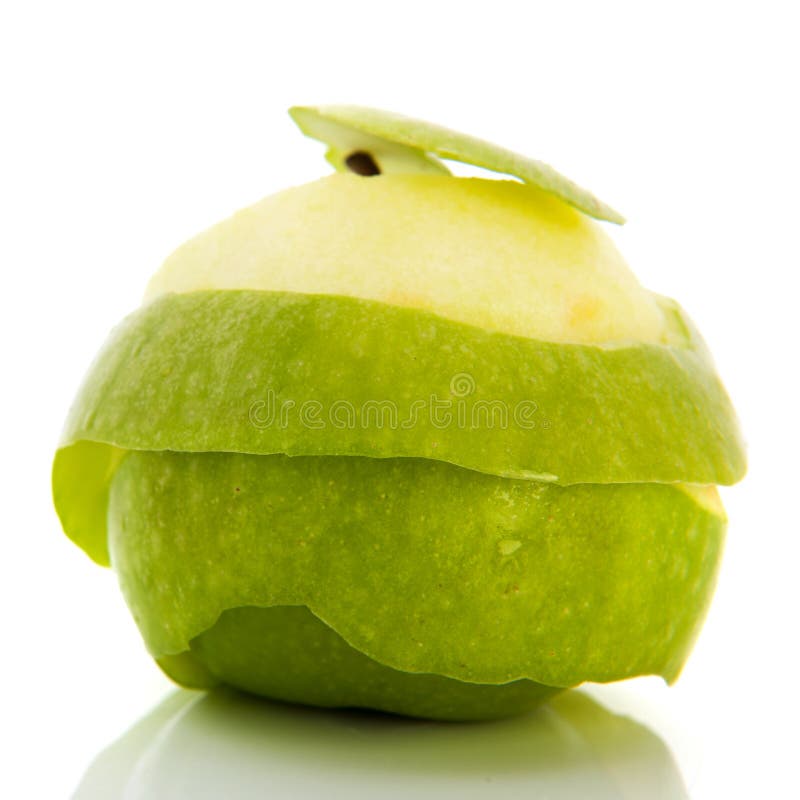 Peladura de la manzana verde imagen de archivo libre de regalías Peladura de la manzana verde imagen de archivo libre de regalías