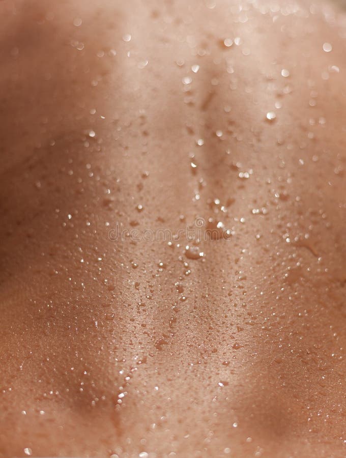 Pelez le dos humide d'humain de fond de texture de plan rapproché de bronzage photographie stock libre de droits Pelez le dos humide d'humain de fond de texture de plan rapproché de bronzage photographie stock libre de droits