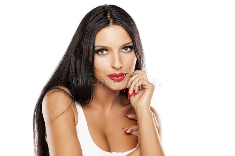 Pelo negro y ojos azules foto de archivo. Imagen de belleza 82313200