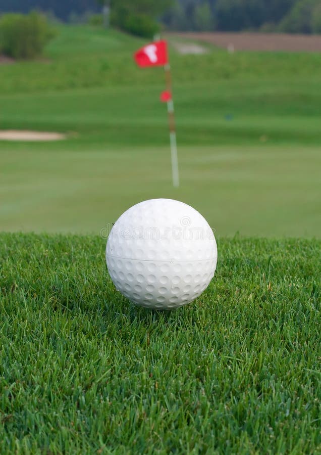 Golf ball near the hole. Golf ball near the hole