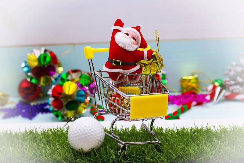 Santa is shopping golf ball for golfer`s gift on Christmas holiday. Santa is shopping golf ball for golfer`s gift on Christmas holiday