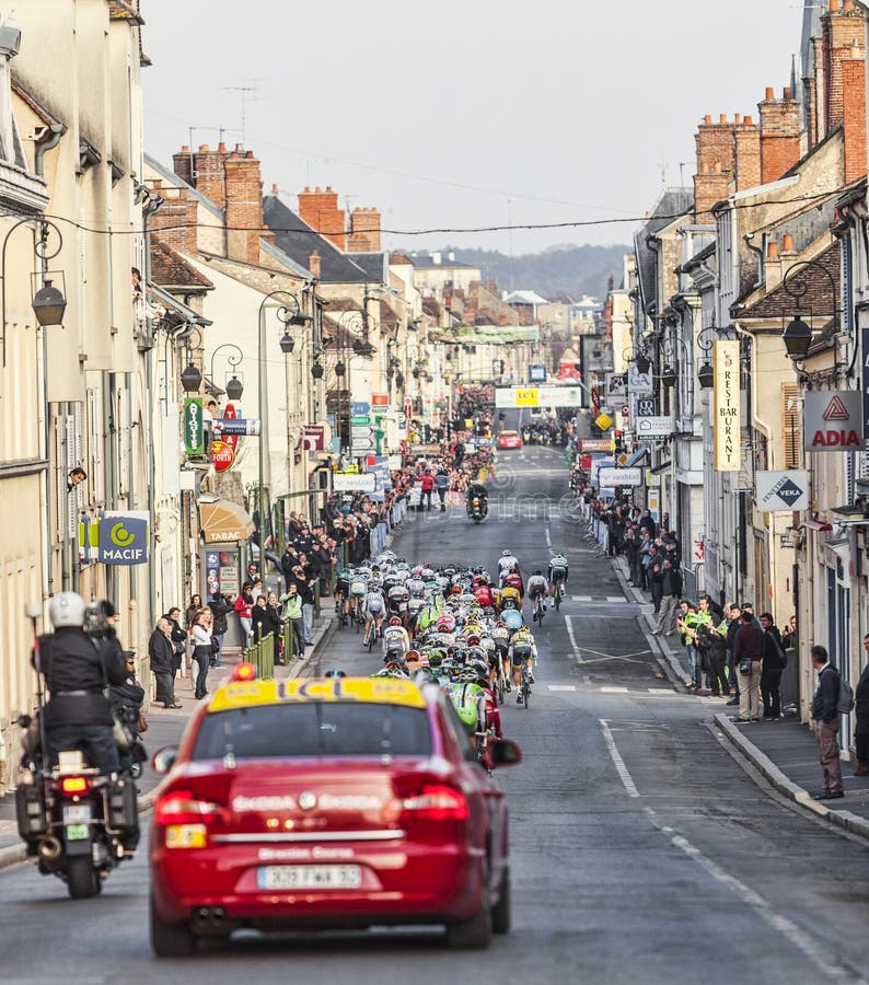 Nemours, France. 4th March 2013. Image of the peloton riding during the first stage of the famous road bicycle race Paris-Nice, on March 4, 2013 in Nemours. Nemours, France. 4th March 2013. Image of the peloton riding during the first stage of the famous road bicycle race Paris-Nice, on March 4, 2013 in Nemours.