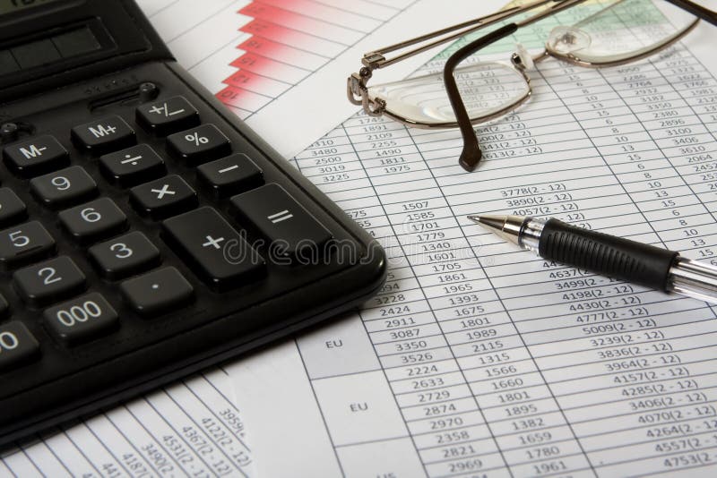 Pen and calculator royalty free stock photos