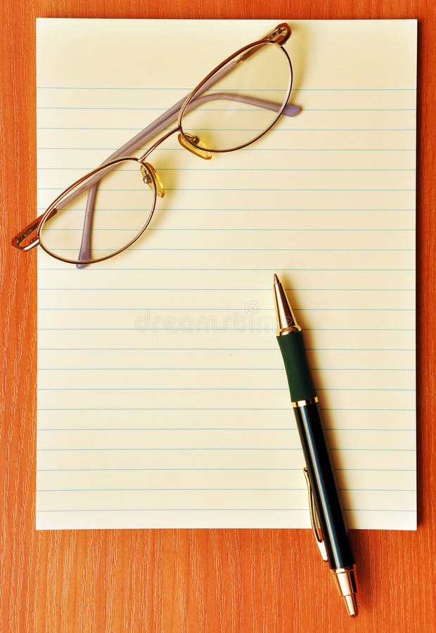Pen and eye glasses stock image. Image of pencil, education 16688243